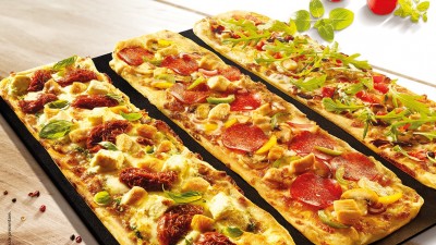 Pizza Hut reintroduce blatul Flatbread, pentru mese de vara usoare