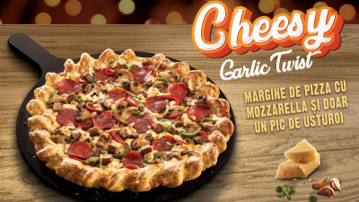 Surprize de sezon &icirc;n meniul Pizza Hut: blatul Cheesy Garlic Twist, vin fiert și ciocolată caldă