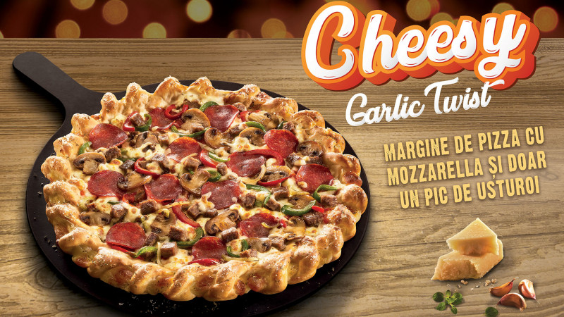 Surprize de sezon în meniul Pizza Hut: blatul Cheesy Garlic Twist, vin fiert și ciocolată caldă